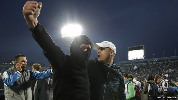 Zenit St Petersburg fans celebrate after a match between Zenit and Dynamo Moscow in April 2012 