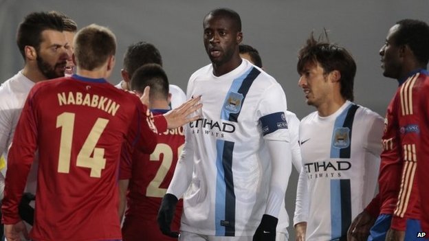 Manchester City's Yaya Toure, centre, talks to CSKA's Kirill Nababkin during a Champions League Group D match in Moscow in October, 2013